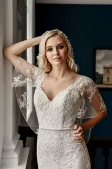 Lace cape wedding dress